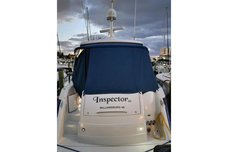 Slide: The Image of 2008 Formula 40 Performance Cruiser docked, rear view with blue cover, Williamsburg VA. - 8
