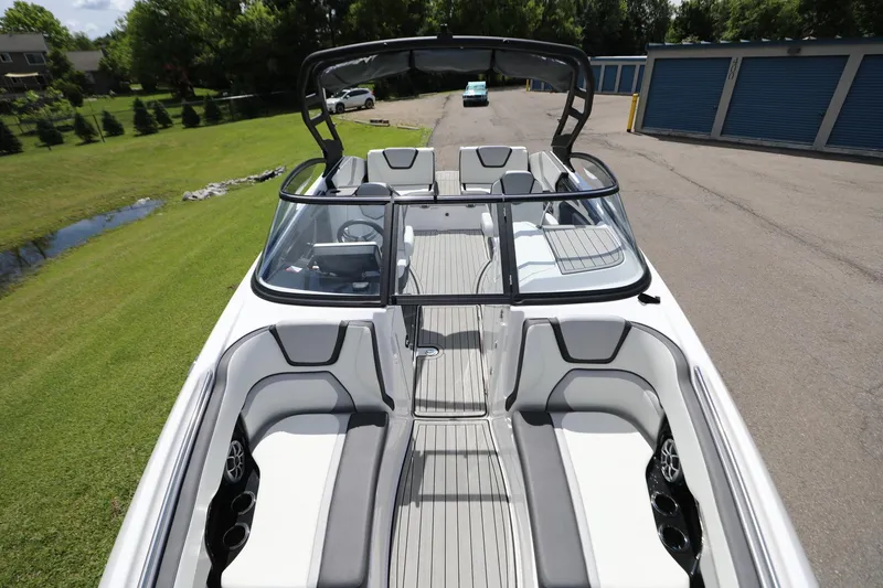 Slide: The Image of 2023 Yamaha Boats 252S interior view, showcasing sleek seating and modern design. - 10