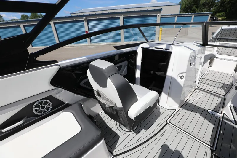 Slide: The Image of 2023 Yamaha Boats 252S interior with sleek seating and modern design. - 15