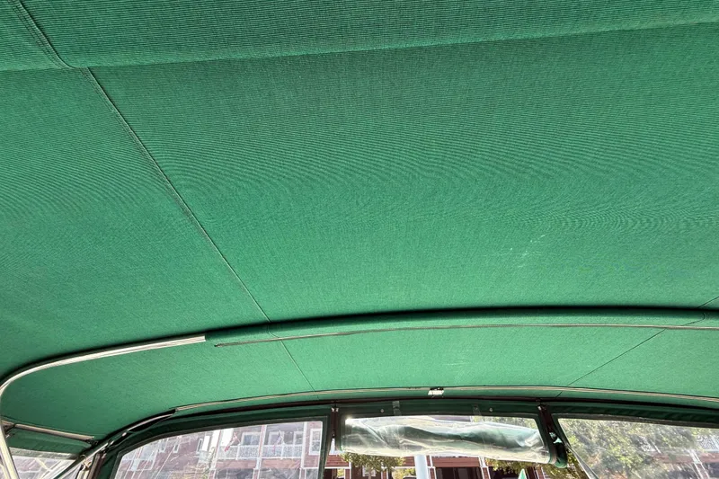 Slide: The Image of Green canopy of a 2000 Mainship 390 Trawler boat, interior view. - 40