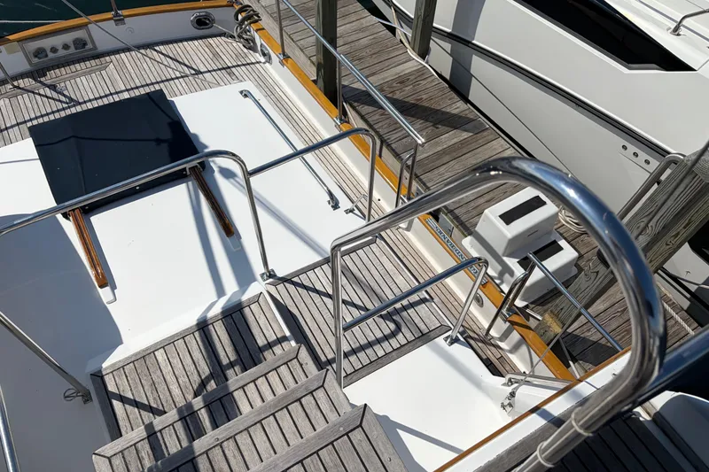 Slide: The Image of Stainless steel railings and wooden deck on 2001 Grand Banks 42 Classic yacht. - 28