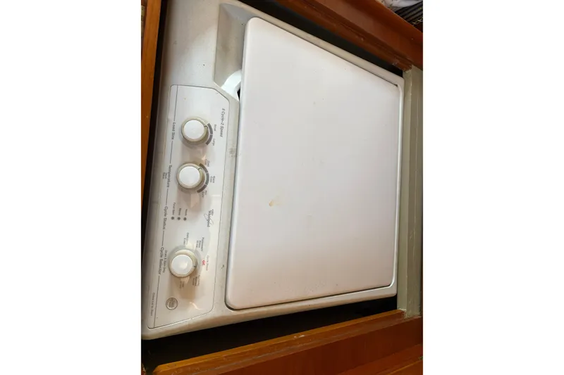 Slide: The Image of Washer controls on a 2001 Grand Banks 42 Classic yacht. - 22