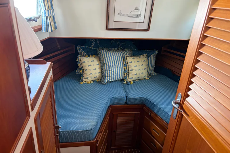 Slide: The Image of Cozy cabin interior of 2001 Grand Banks 42 Classic yacht with nautical decor. - 25