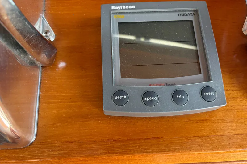 Slide: The Image of Raytheon ST60 Tridata display on 2001 Grand Banks 42 Classic yacht dashboard. - 15