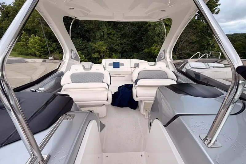 Slide: The Image of Interior view of 2012 Chaparral 327 SSX boat with luxurious seating and sleek design. - 12