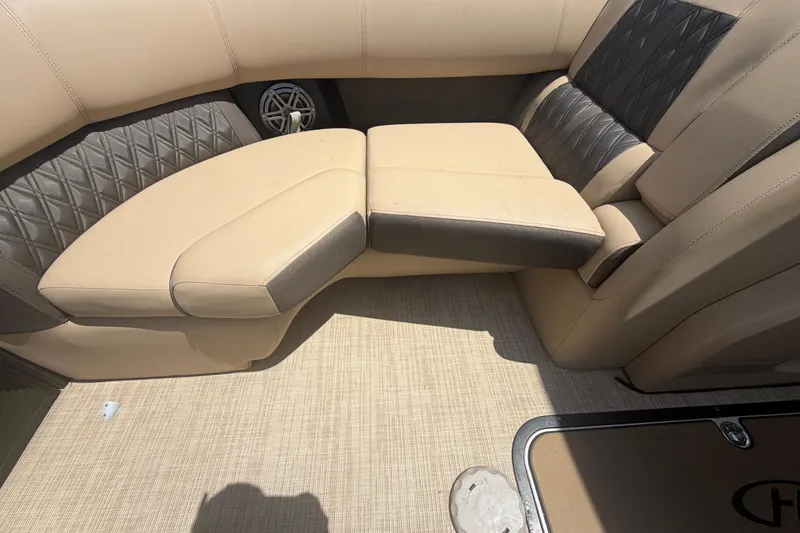 Slide: The Image of Luxurious seating on 2021 Harris Solstice 230 boat with beige and gray upholstery. - 63
