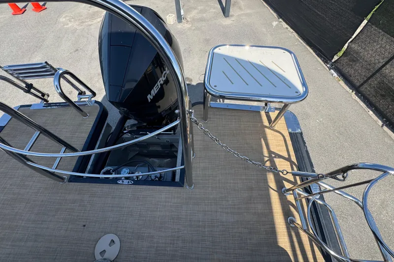 Slide: The Image of 2021 Harris Solstice 230 boat with Mercury engine and stainless steel railing. - 31