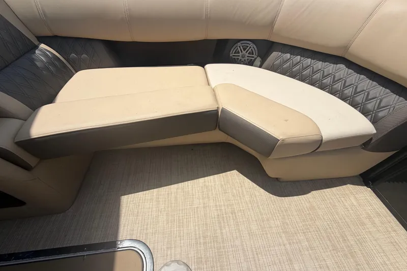 Slide: The Image of Luxurious seating on 2021 Harris Solstice 230 boat, featuring beige and gray upholstery. - 61