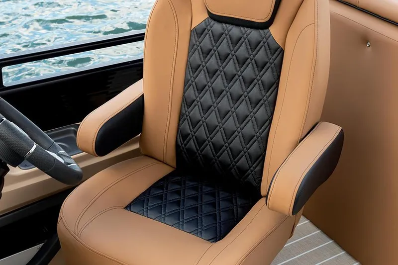 Slide: The Image of Manufacturer Provided Image: Luxurious tan and black diamond-stitched seat on 2021 Harris Solstice 230 boat. - 13