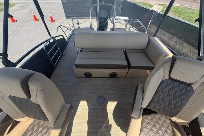 Slide: The Image of Interior of 2021 Harris Solstice 230 boat with luxurious seating and modern design. - 17