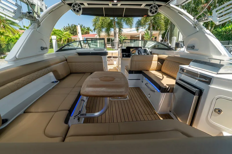 Slide: The Image of Luxurious interior of 2022 Sea Ray SDX 290 boat with plush seating and modern amenities. - 33