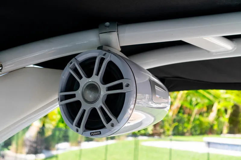 Slide: The Image of Fusion marine speaker on 2022 Sea Ray SDX 290 boat, mounted under canopy. - 41