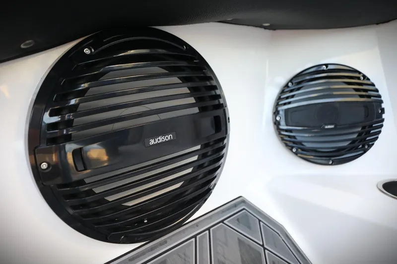 Slide: The Image of 2024 Tigé 22RZX boat featuring Audison speakers for premium sound quality. - 13