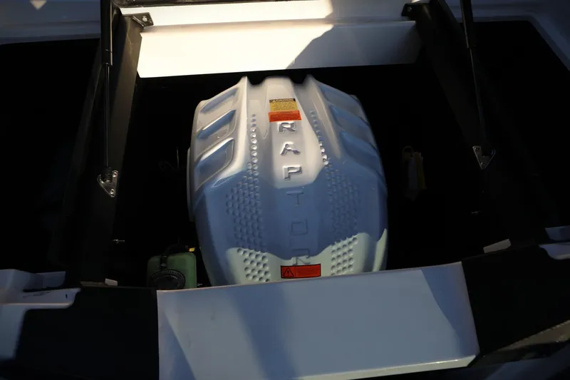 Slide: The Image of 2024 Tigé 22RZX boat engine compartment featuring a Raptor engine. - 15