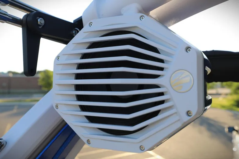 Slide: The Image of Close-up of a 2024 Tigé 22RZX boat speaker with a white grille. - 11