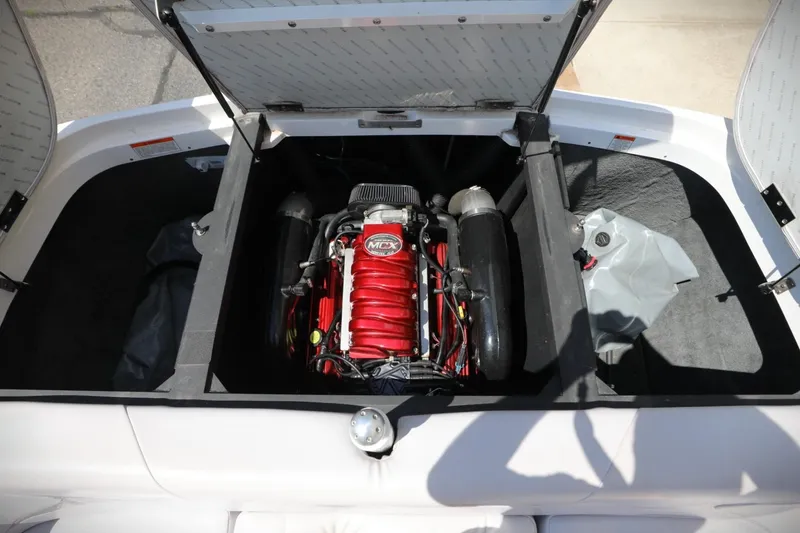 Slide: The Image of 2007 MasterCraft X-15 engine compartment with red MCX engine, open hatch view. - 8