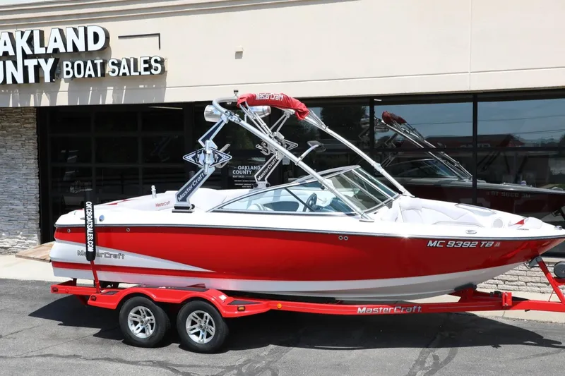 Slide: The Image of Red 2007 MasterCraft X-15 boat on trailer at Oakland County Boat Sales. - 4
