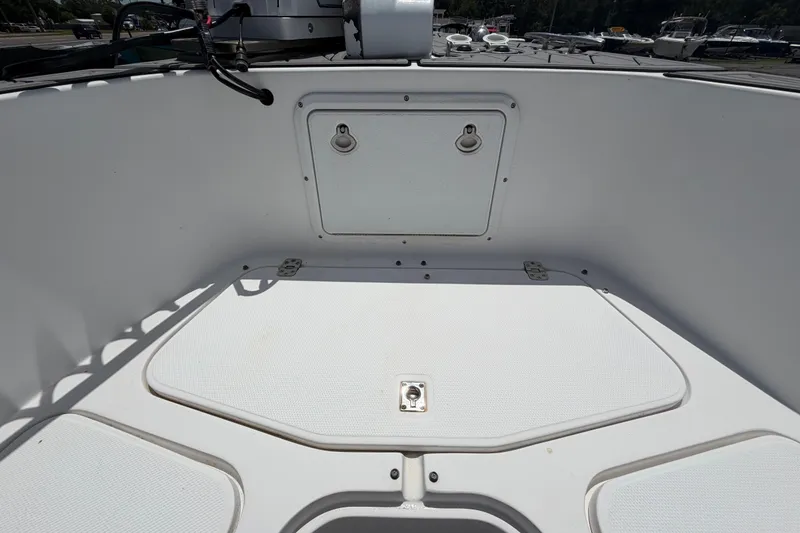 Slide: The Image of 2006 Pro Sports 2550 BW boat interior with storage compartments and clean white surfaces. - 41