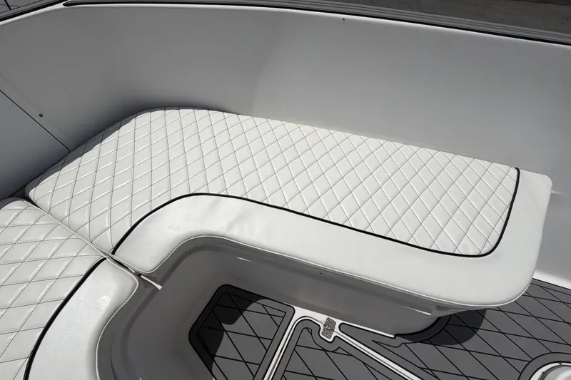 Slide: The Image of White quilted seating on 2006 Pro Sports 2550 BW boat, featuring sleek design and comfort. - 38