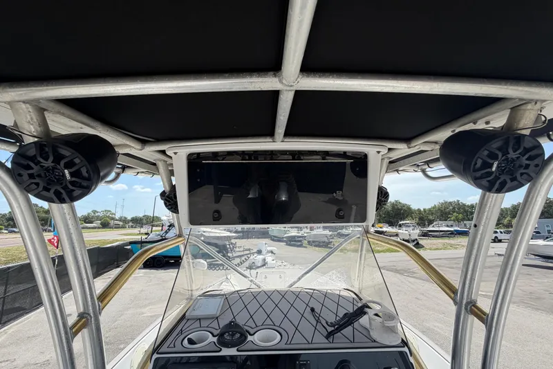 Slide: The Image of 2006 Pro Sports 2550 BW boat interior with speakers and control panel. - 20