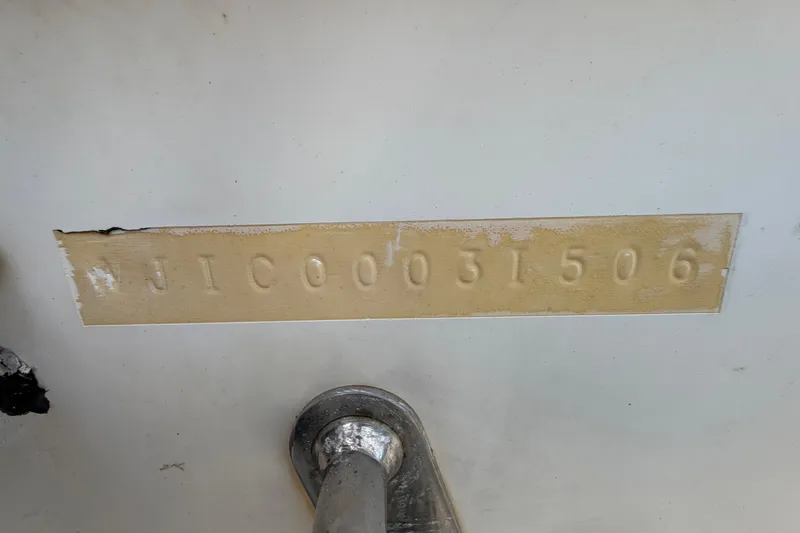 Slide: The Image of Hull identification number on a 2006 Pro Sports 2550 BW boat. - 75