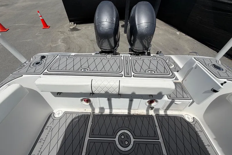 Slide: The Image of 2006 Pro Sports 2550 BW boat deck with dual engines and non-slip flooring. - 62
