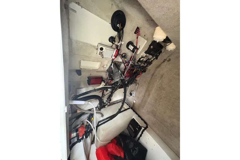 Slide: The Image of Electrical wiring and components inside a 2006 Pro Sports 2550 BW boat. - 18