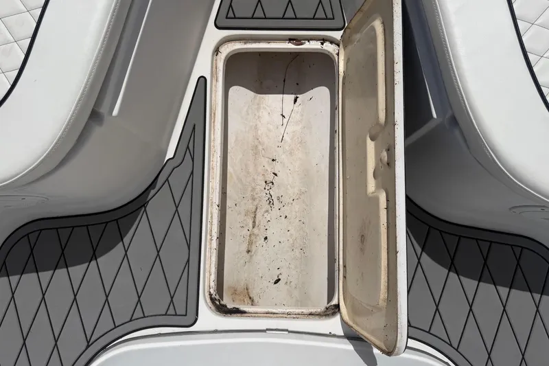 Slide: The Image of Open storage compartment on 2006 Pro Sports 2550 BW boat deck. - 34