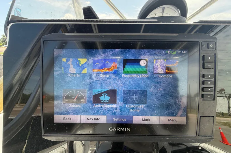 Slide: The Image of Garmin marine GPS display on a 2006 Pro Sports 2550 BW boat dashboard. - 23