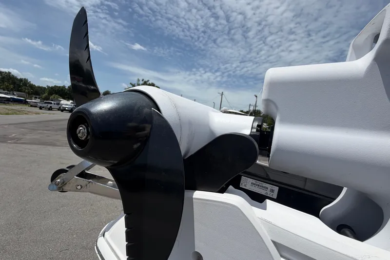Slide: The Image of Close-up of a 2006 Pro Sports 2550 BW boat propeller under a partly cloudy sky. - 46