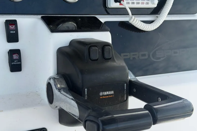 Slide: The Image of Control panel of a 2006 Pro Sports 2550 BW boat with Yamaha throttle. - 29