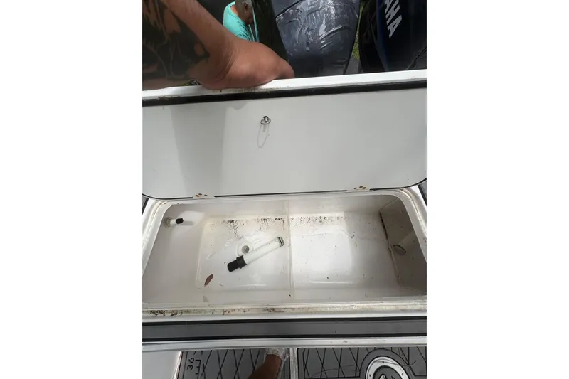 Slide: The Image of Open storage compartment on a 2006 Pro Sports 2550 BW boat, showing interior details. - 30