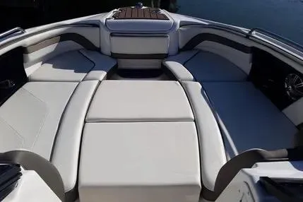 Slide: The Image of 2016 Yamaha Boats 242 Limited S E-Series interior with spacious seating and sleek design. - 18