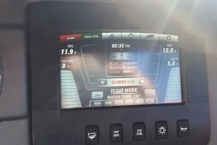 Slide: The Image of Dashboard display of a 2016 Yamaha Boats 242 Limited S E-Series, showing system information. - 16