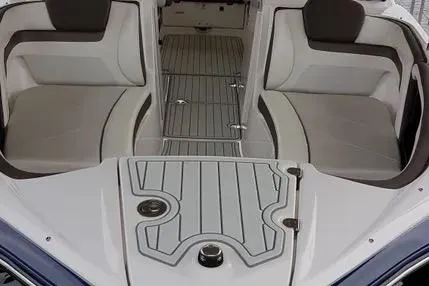 Slide: The Image of Interior view of a 2016 Yamaha Boats 242 Limited S E-Series, featuring sleek seating and flooring. - 19