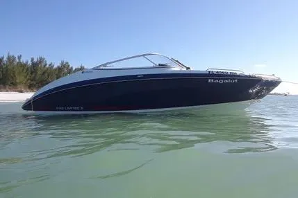 Slide: The Image of 2016 Yamaha Boats 242 Limited S E-Series on calm water near a sandy beach. - 9