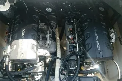 Slide: The Image of 2016 Yamaha Boats 242 Limited S E-Series engine compartment with dual high-output engines. - 12