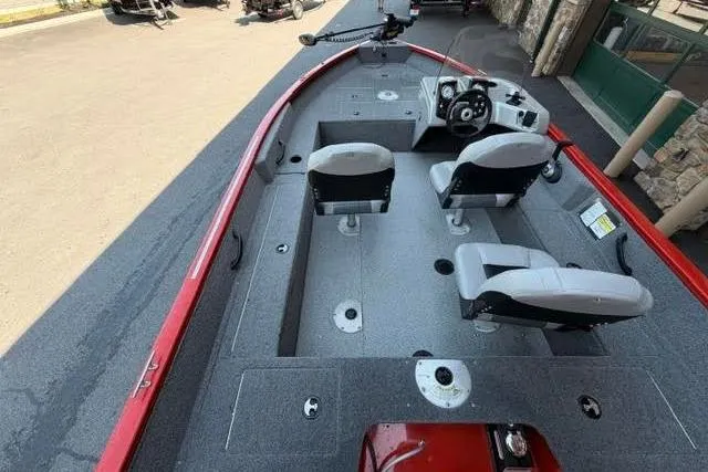 Slide: The Image of 2017 Tracker Pro Guide V-16 SC fishing boat with dual seats and steering console. - 4