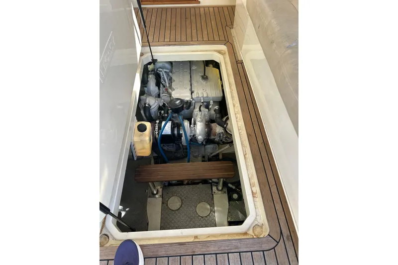 Slide: The Image of Engine compartment of a 2007 Legacy EXPRESS CRUISER, showcasing detailed mechanical components. - 39