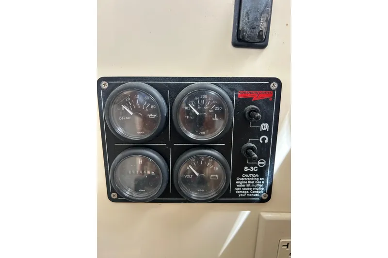 Slide: The Image of Control panel of a 2007 Legacy EXPRESS CRUISER with gauges and switches. - 18