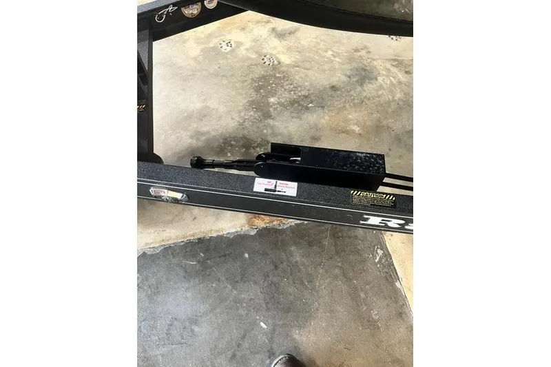 Slide: The Image of Close-up of 2026 Ranger Z519R boat trailer hitch on concrete floor. - 9