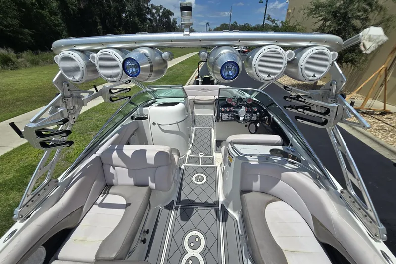 Slide: The Image of 2006 MasterCraft X-80 boat interior with speakers and seating, showcasing luxury and functionality. - 2