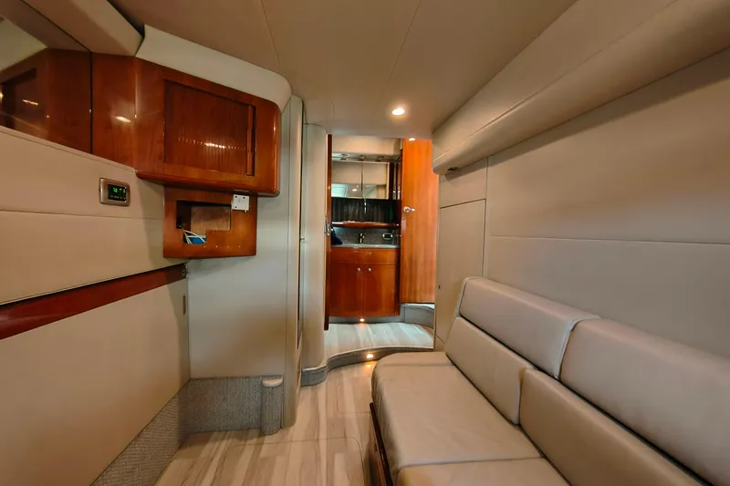 Slide: The Image of Interior of a 2005 Formula 48 Yacht with modern wood cabinetry and seating. - 20