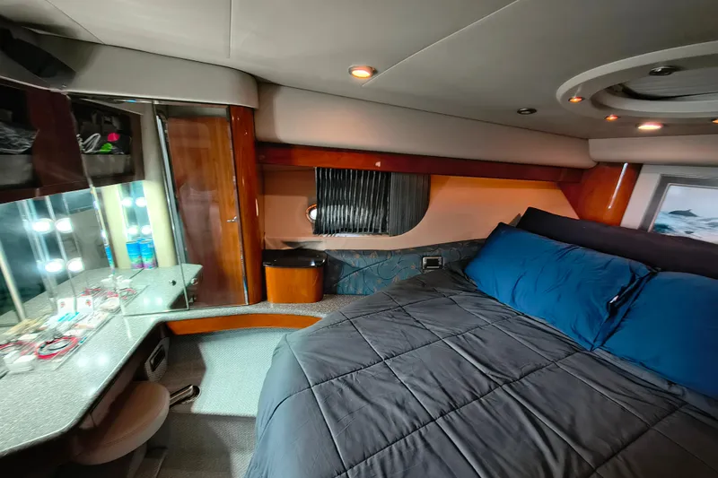 Slide: The Image of Luxurious bedroom interior of a 2005 Formula 48 Yacht with elegant furnishings and lighting. - 18