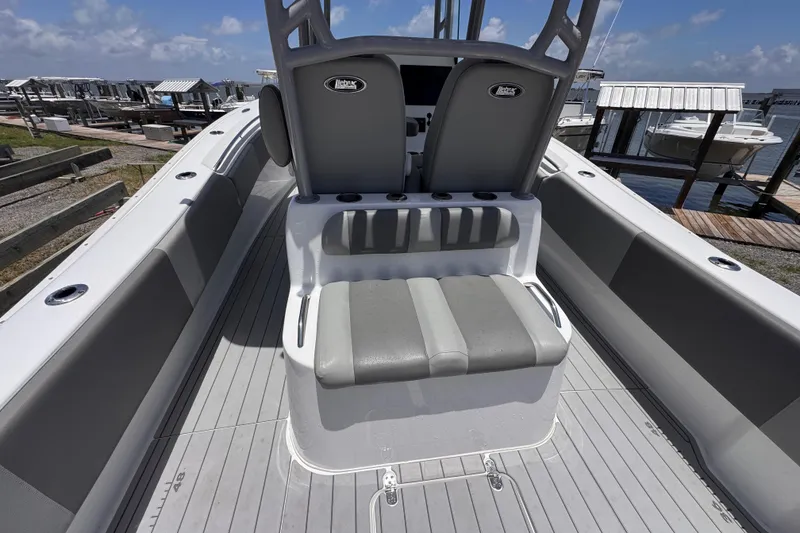 Slide: The Image of 2020 Cape Horn 32XS boat interior with seating and rod holders. - 8