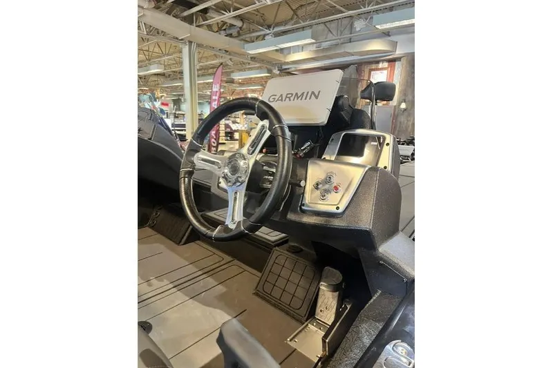 The Image of Interior of 2026 Tracker Savage 215 boat with Garmin navigation system. - 1