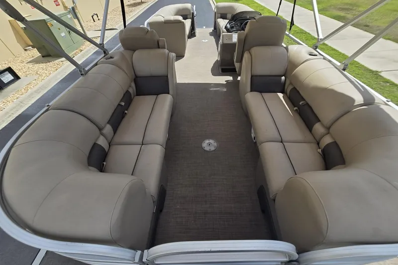 Slide: The Image of 2021 Sun Tracker Party Barge 24 DLX interior with spacious seating and modern design. - 8