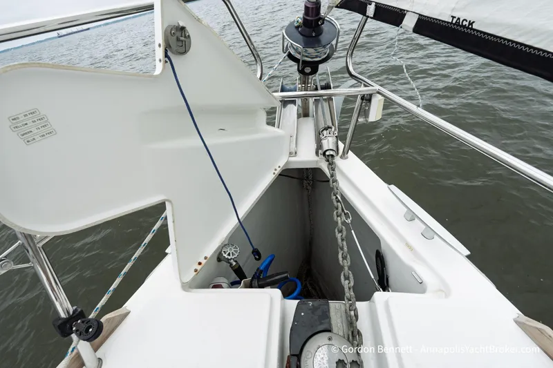 Slide: The Image of 2015 Jeanneau Sun Odyssey 439 sailboat deck with anchor chain and winch system. - 15