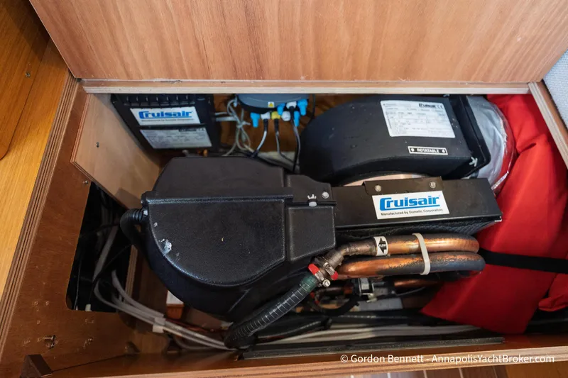 Slide: The Image of Cruisair system inside 2015 Jeanneau Sun Odyssey 439 yacht, showcasing compact installation. - 66