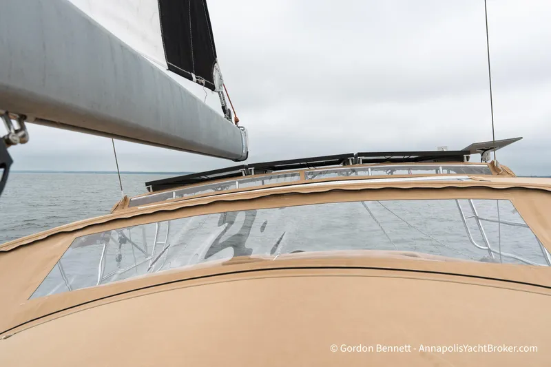 Slide: The Image of 2015 Jeanneau Sun Odyssey 439 sailing on calm waters under cloudy skies. - 21